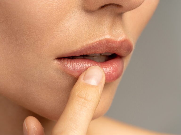 Experts Explain Lip Flip Vs. Filler And How To Decide